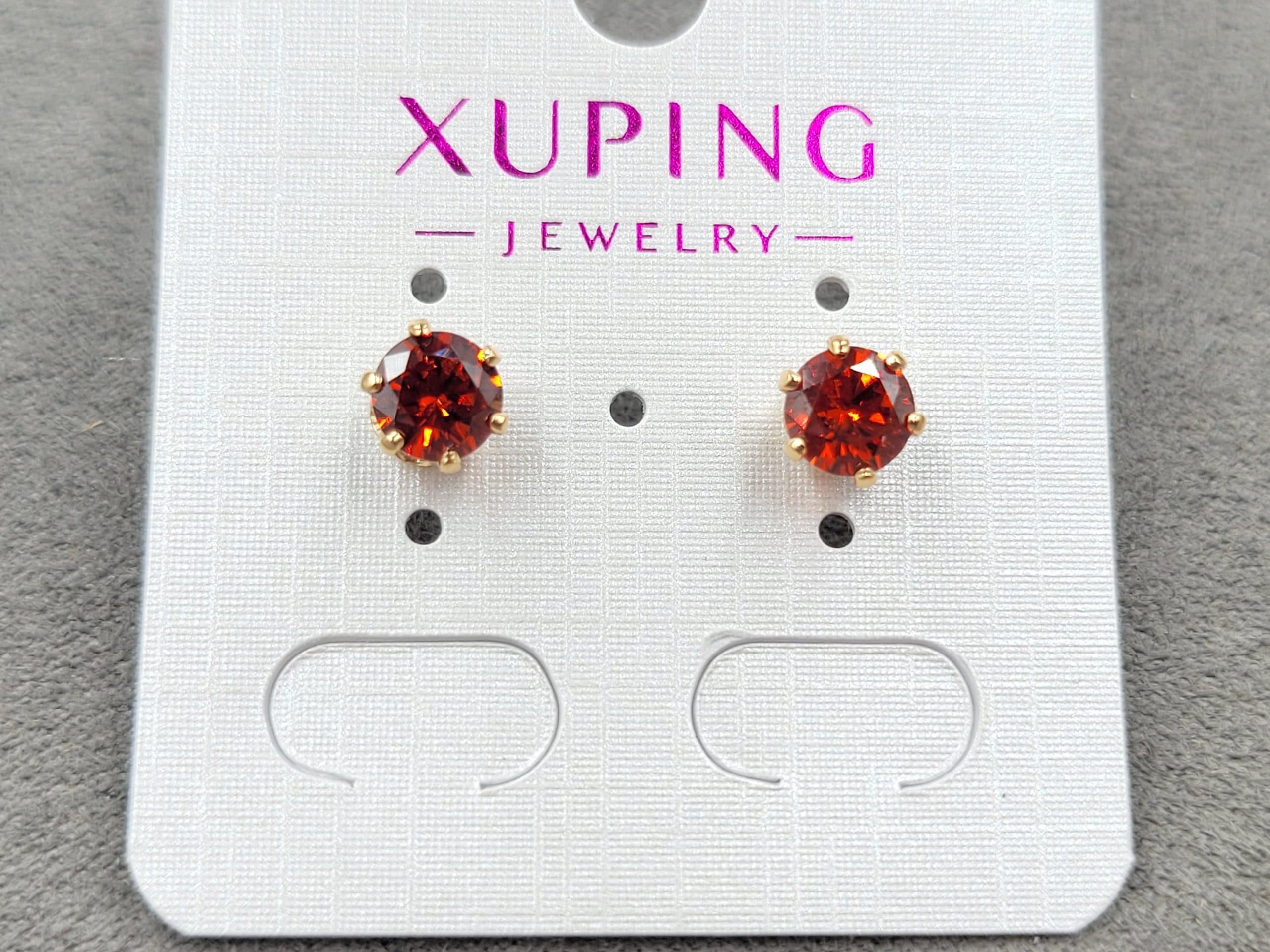 Гвоздики Xuping з червоним стразом 7 мм колір 18к