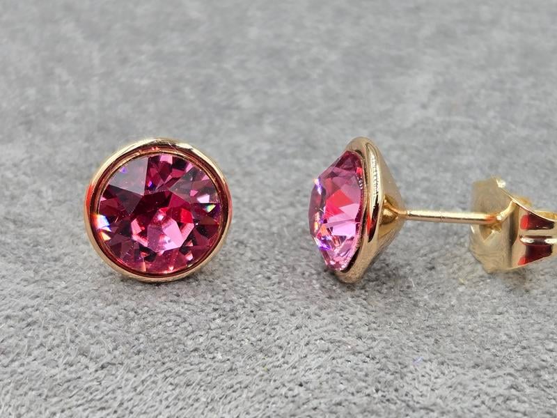 Гвоздики Xuping 9 мм з рожевим стразом Swarovski колір 18к