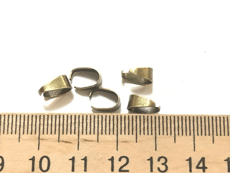 Держатели для бусин 8*7 около 100 шт цвет бронза