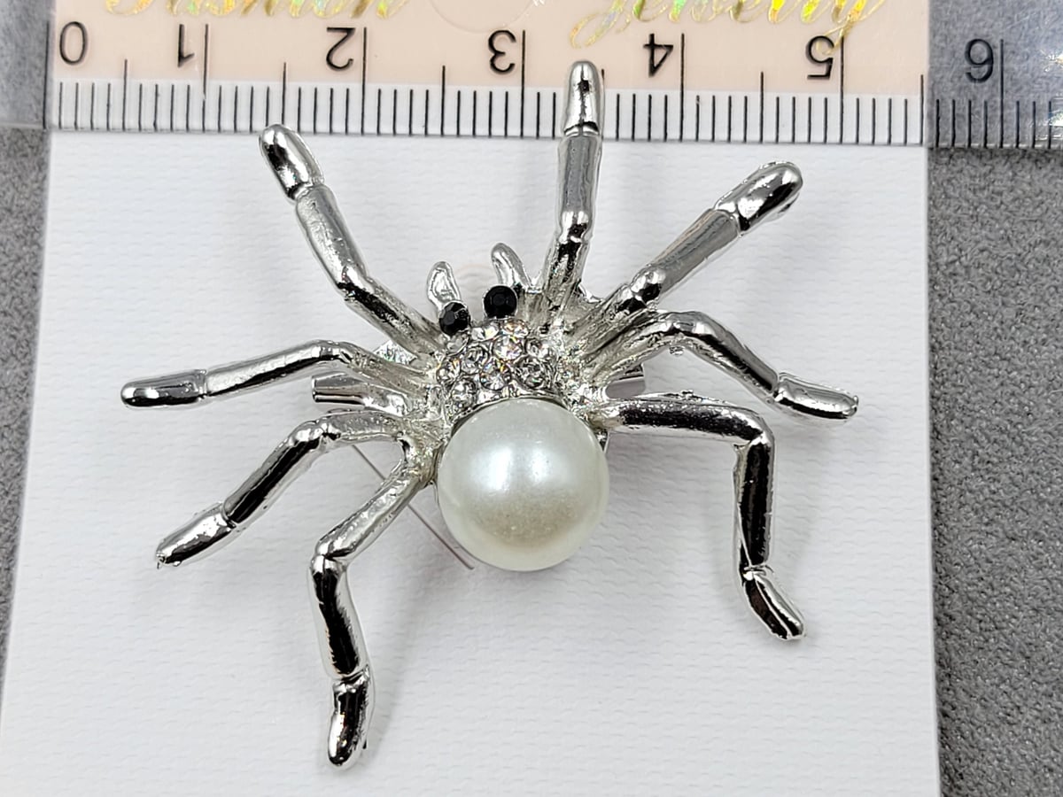 Брошь колір срібло