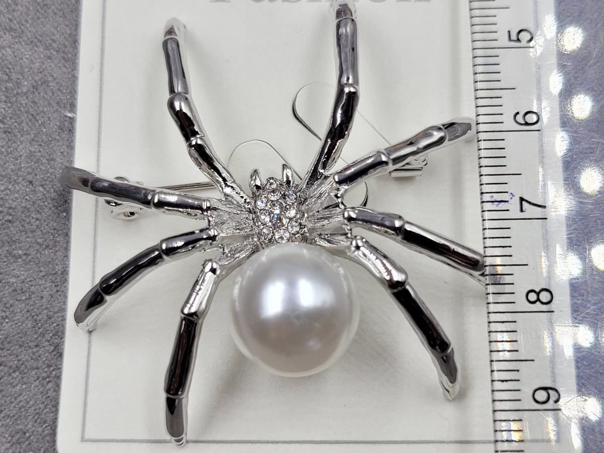 Брошь колір срібло