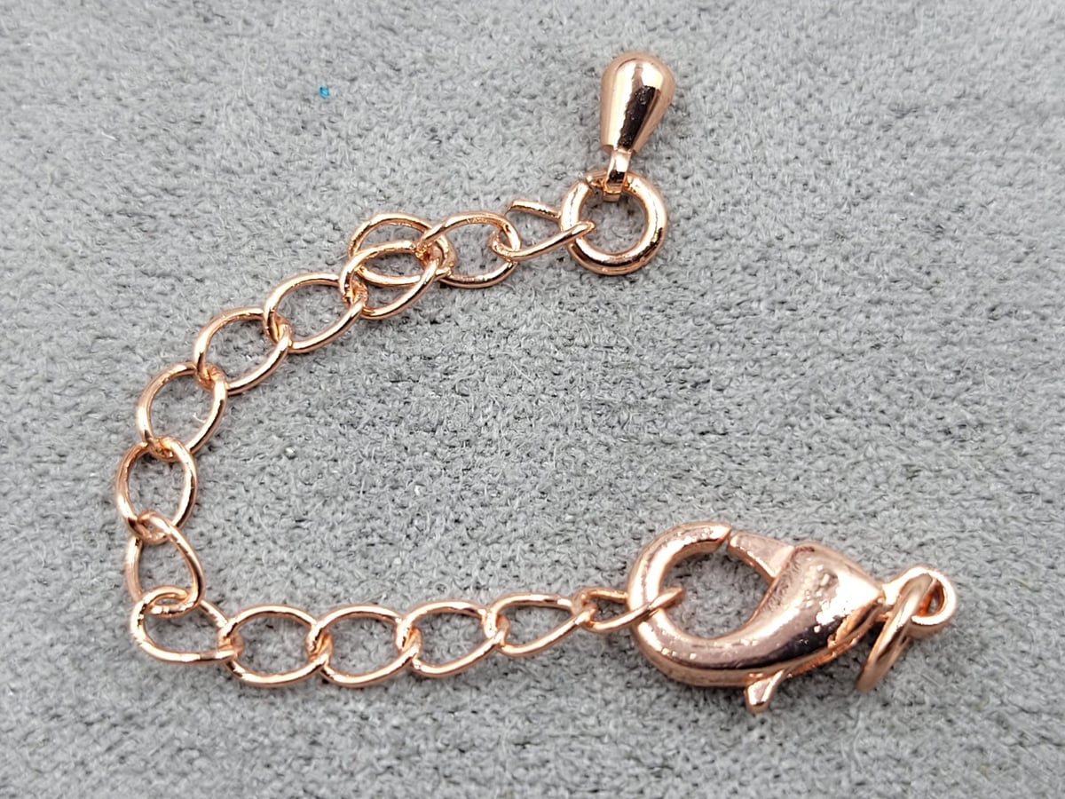 Замок 12 мм колір рожеве золото з підвіскою крапля (гіпоалергенний сплав)