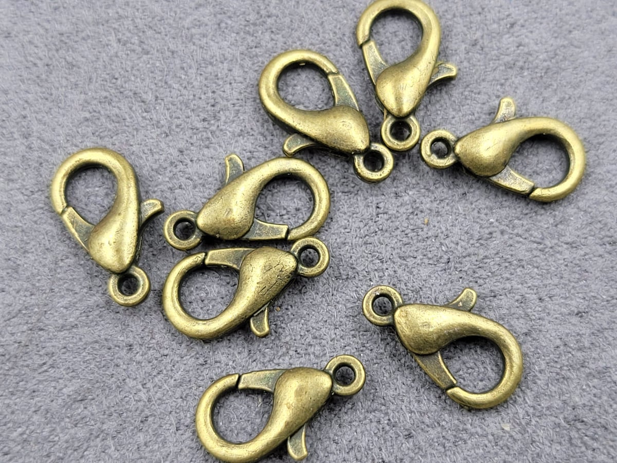 Замок (мідь з напиленням) 14 мм 100 шт колір бронза