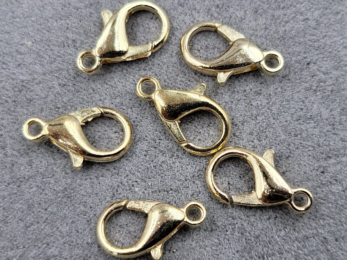 Замок (мідь з напиленням)14 мм 100 шт колір золото