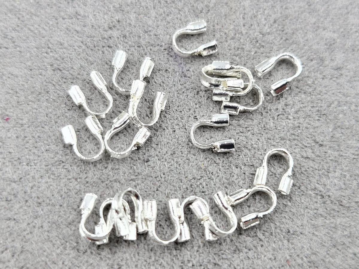 Протектори 20 шт колір срібло гіпоалергений сплав