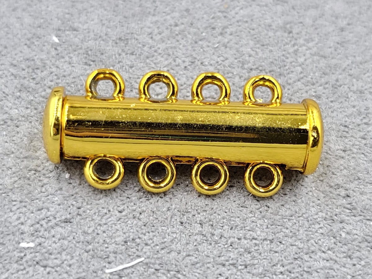 Замок магнітний 6*24 мм на 4 линии колір лимонне золото