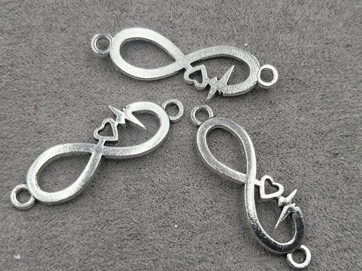 Конектор безкінечність 9*33 мм 20 шт металічний