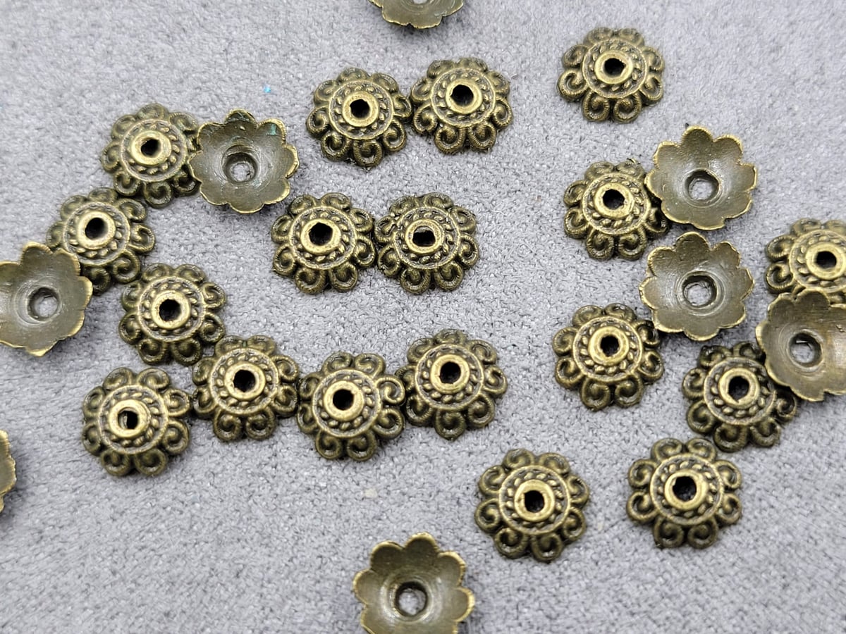 Обіймачі 8 мм 145 шт бронза  металічні