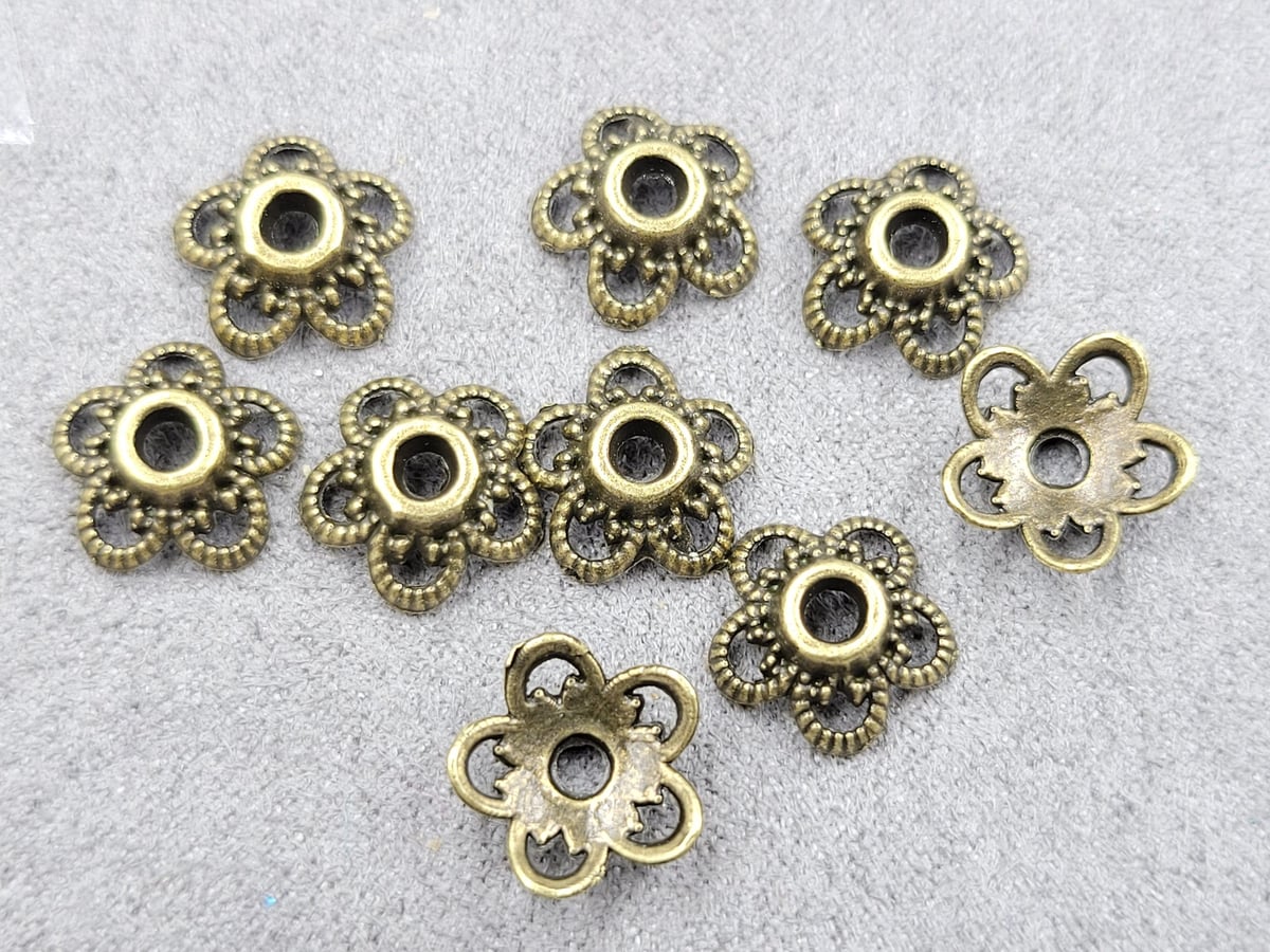 Обіймачі 11 мм 55 шт бронза металічні