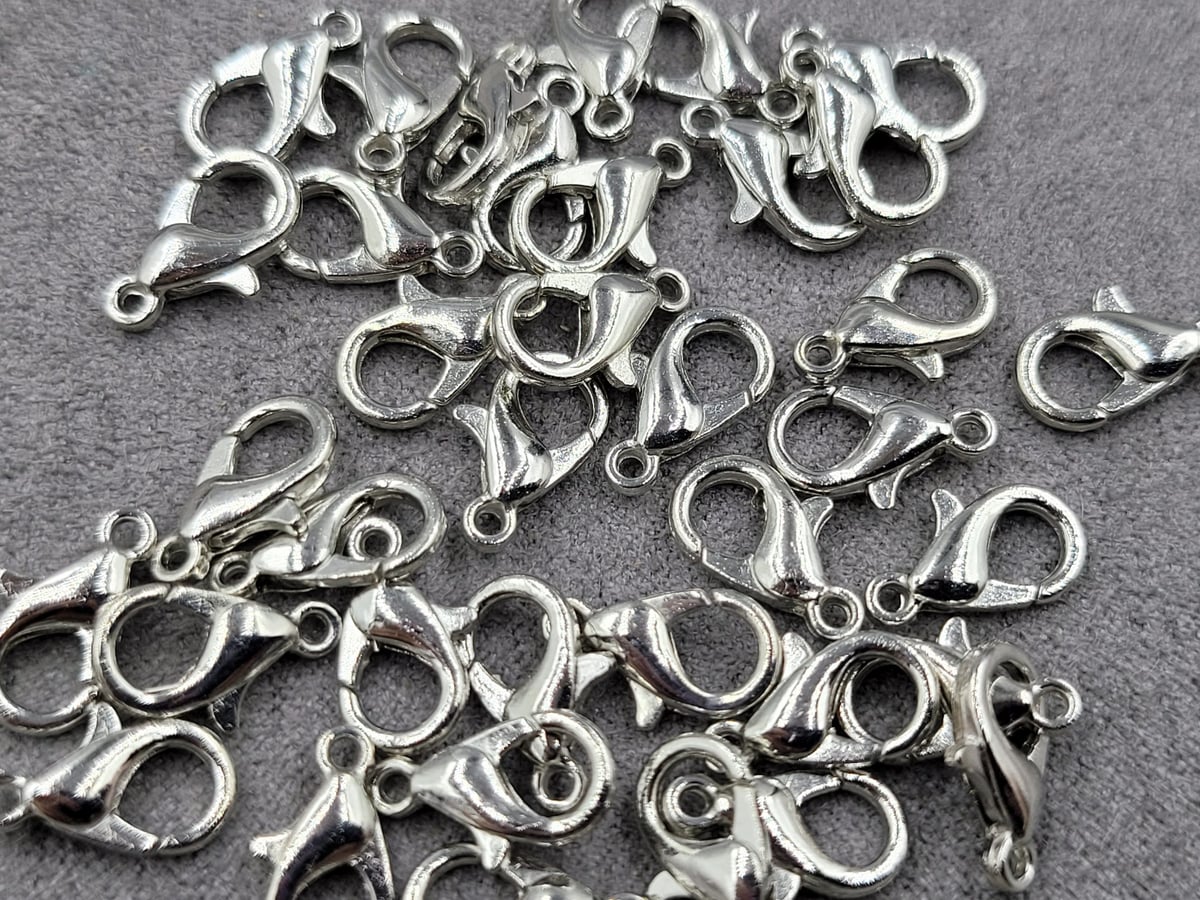 Замки 12 мм (металл) 100 шт колір сталь