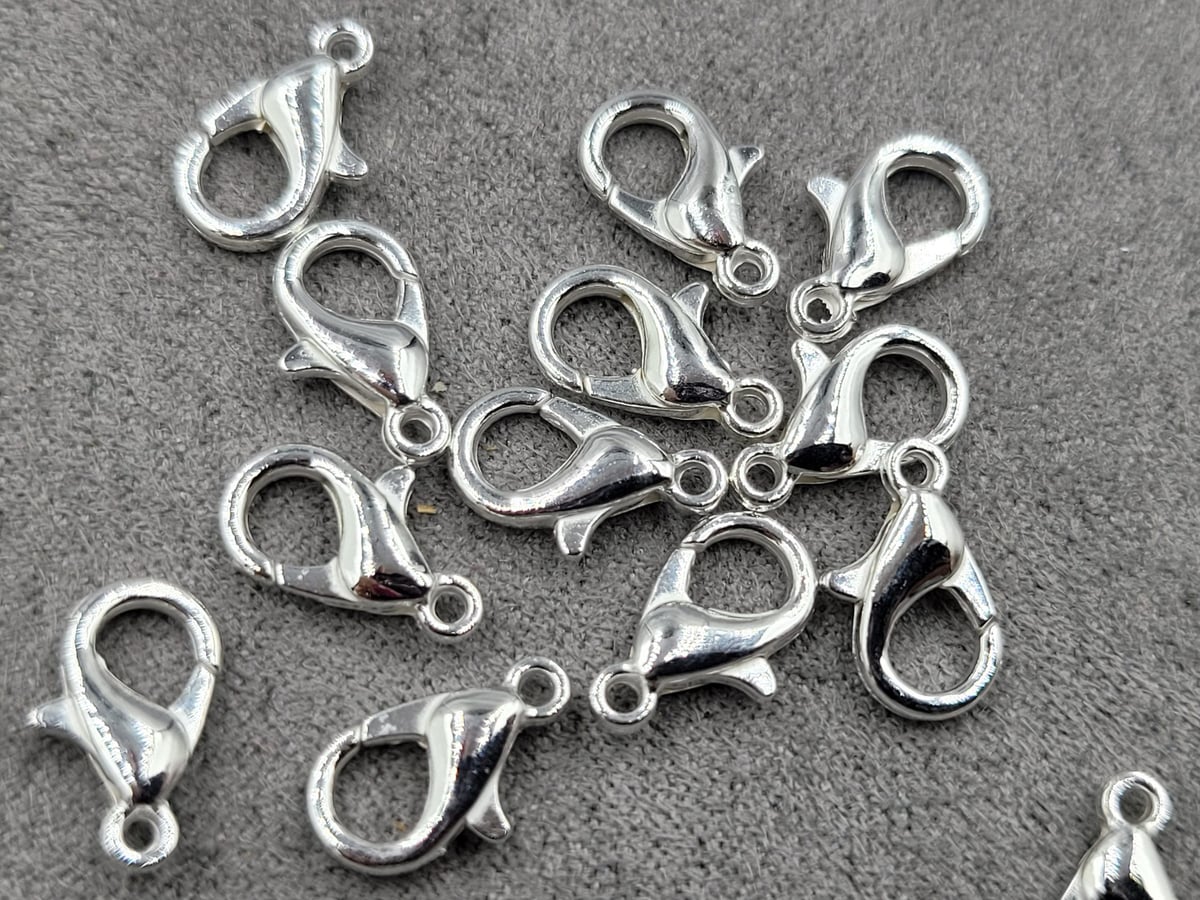 Замки 12 мм (металл) 100 шт колір срібло