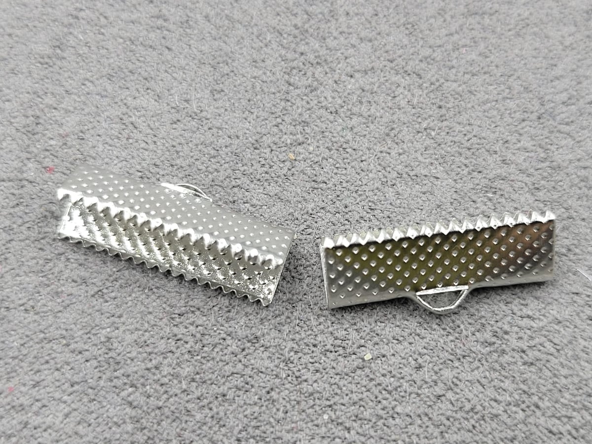 Затискач на стрічку 2 см 20 шт колір сталь