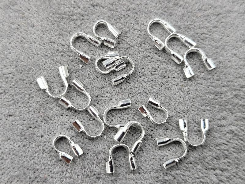 Протектори 4 мм 140 штук колір срібло металічні