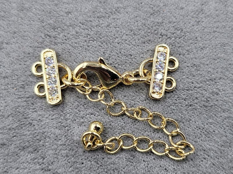 Замок 12 мм на 2 лініі з фіанітами колір золото (гіпоалергенний сплав)