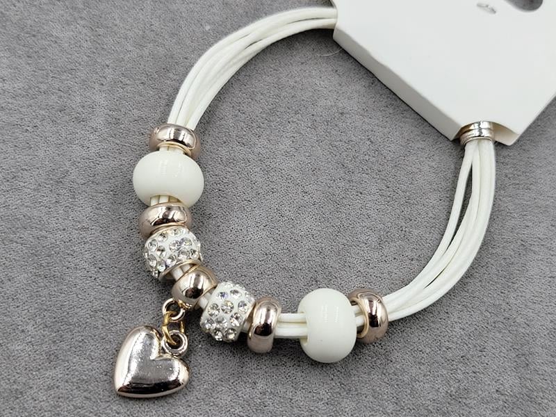 Браслет білий с підвіскою серце колір золото