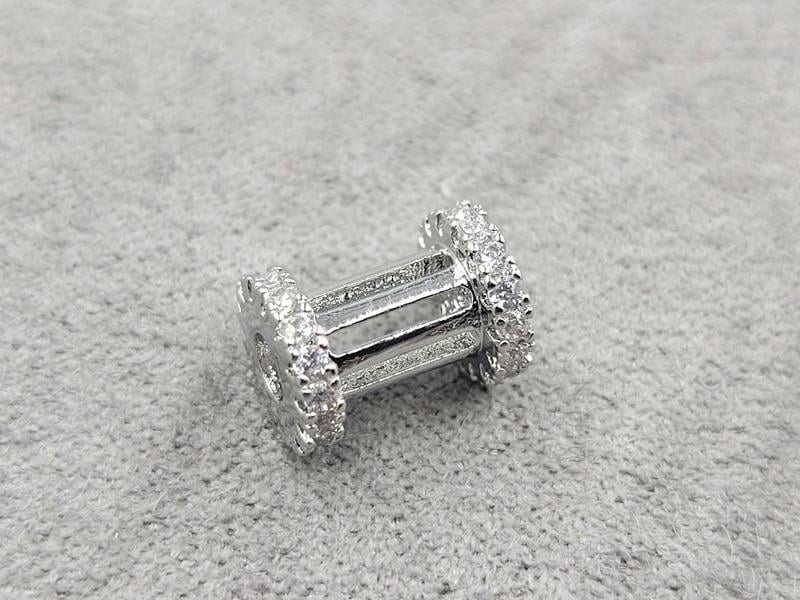 Бусина 10 мм т. 7 мм з фіанітами родій (гіпоалергений сплав)