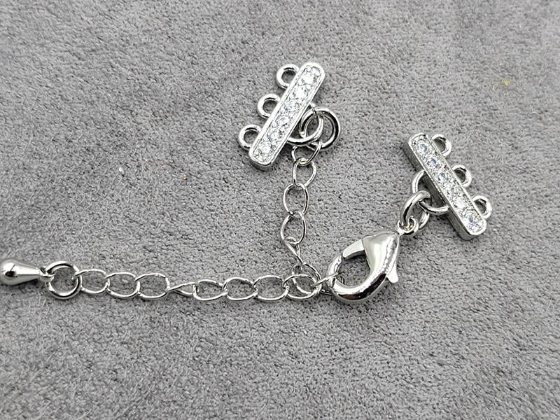 Замок на 3 лініі з фіанітами родій (гіпоалергений сплав)