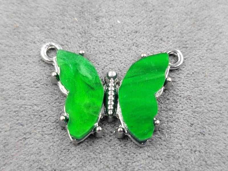 Конектор метелик 24*16 мм в металі стального кольору