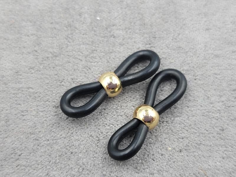 Конектори для окулярів 2 шт бусина 5 мм колір золото (гіпоалергений сплав) на чорному сіліконі