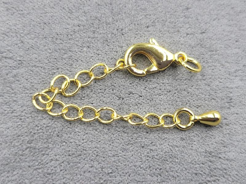 Замок 12 мм колір лимоне золото з підвіскою крапля (гіпоалергенний сплав)