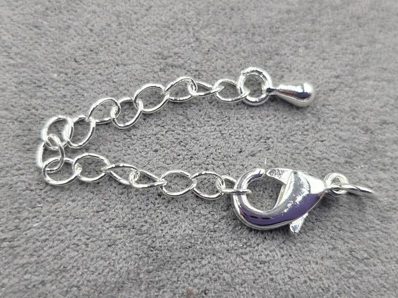 Замок 12 мм колір срібло з підвіскою крапля (гіпоалергенний сплав)