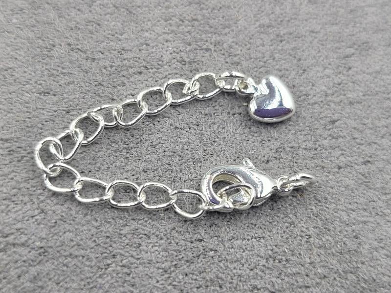 Замок 10 мм колір срібло з підвіскою серце (гіпоалергенний сплав)