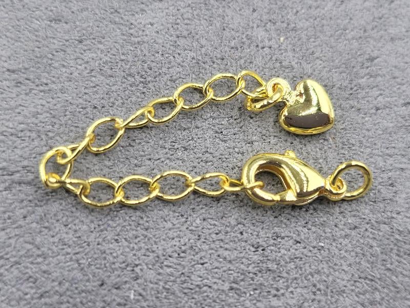 Замок 10 мм колір лимоне золото з підвіскою серце  (гіпоалергенний сплав)