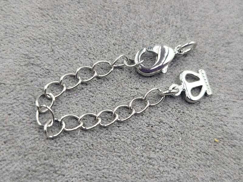 Замок 10 мм колір сталь з підвіскою корона (гіпоалергенний сплав)