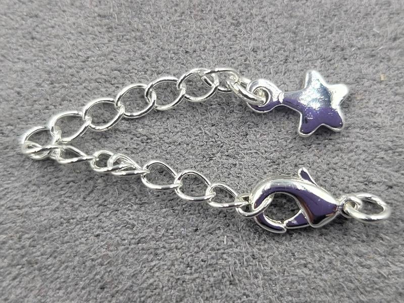 Замок 10 мм колір срібло з підвіскою зірка (гіпоалергенний сплав)