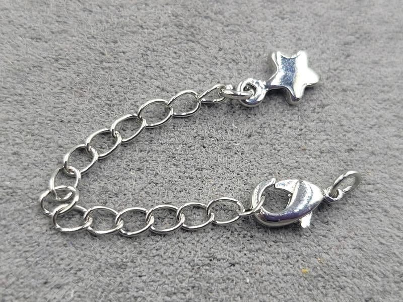 Замок 10 мм колір сталь з підвіскою зірка (гіпоалергенний сплав)