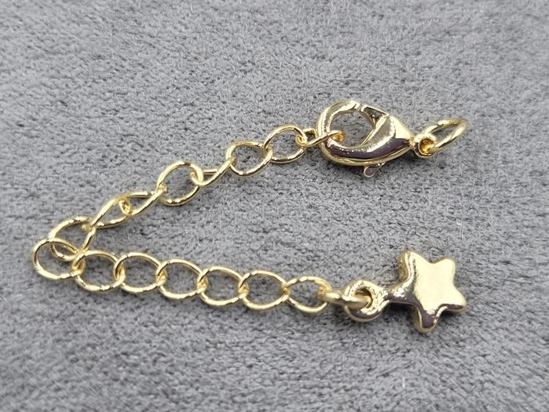 Замок 10 мм колір золото з підвіскою зірка (гіпоалергенний сплав)