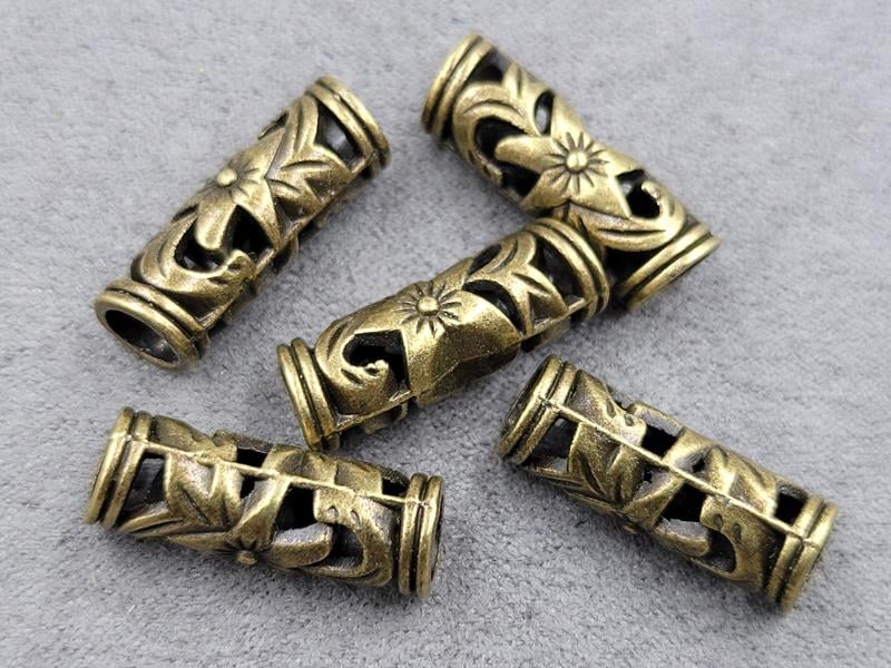 Бусини 22*7 мм отв. 5 мм 10 шт колір бронза (металл)