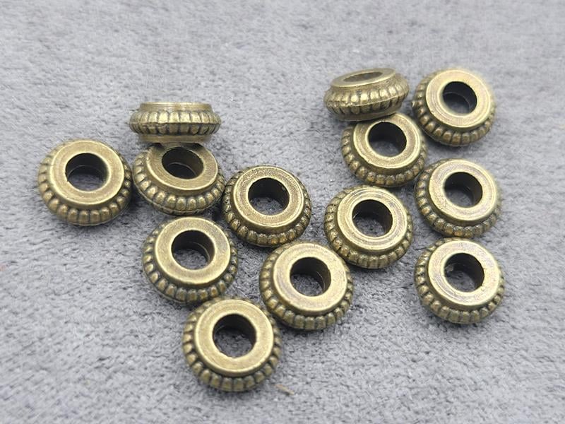 Ронделі 6,8*2,8 мм 56 шт колір бронза метал