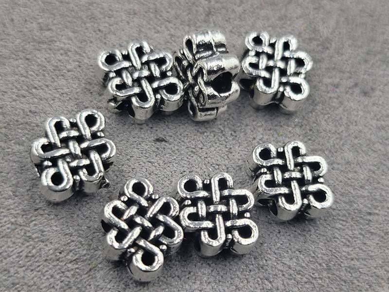 Бусини 9*11 мм 18 шт метал