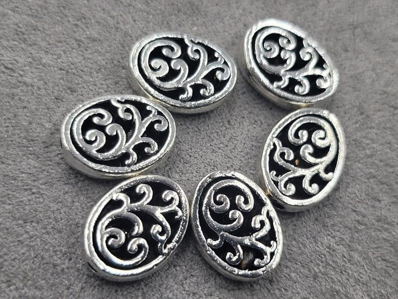 Бусини 9*12 мм 18 шт (металл)