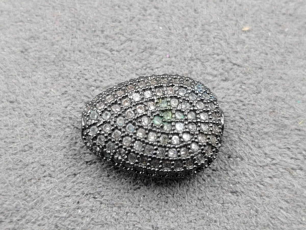 Бусина 11*14 мм т. 6 мм колір чорний з білими стразами ( гіпоалергений сплав)