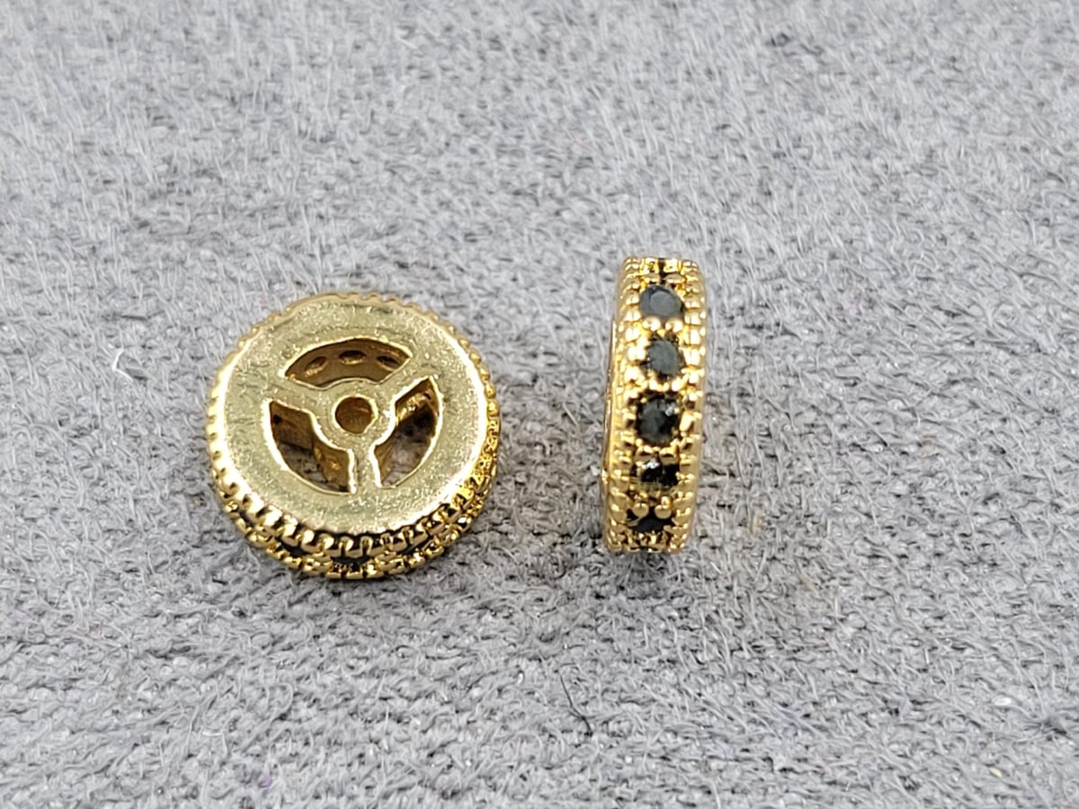 Рондель 2*7,3 мм колір лимонне золото з чорними стразами (гіпоалергений сплав)