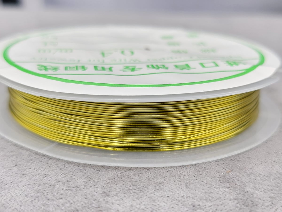 Дріт 0,4 мм 10 метр. 1 шт металічна лимонний