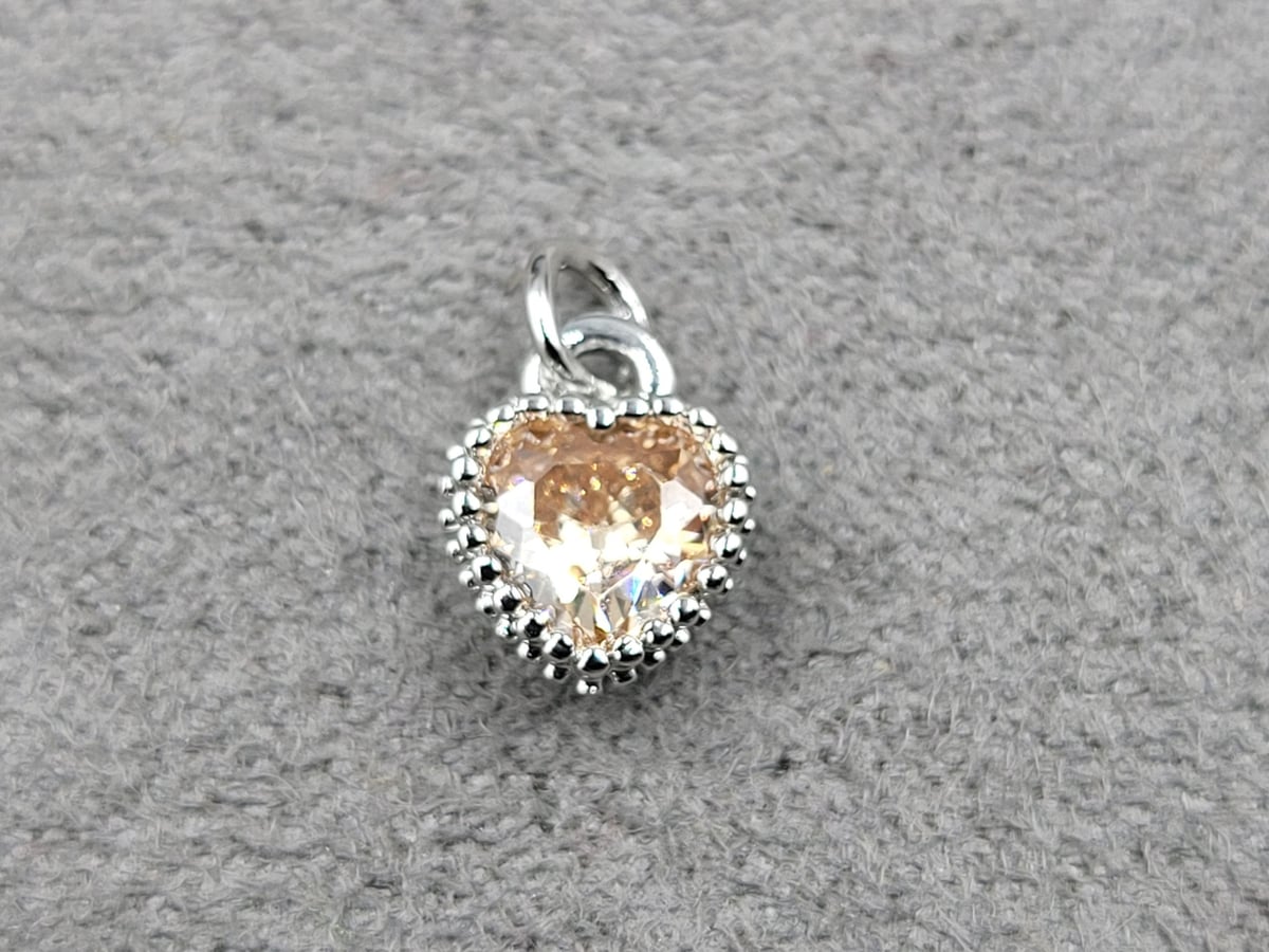 Підвіска 7*9 мм з персиковим стразом родій (гіпоалергений сплав)