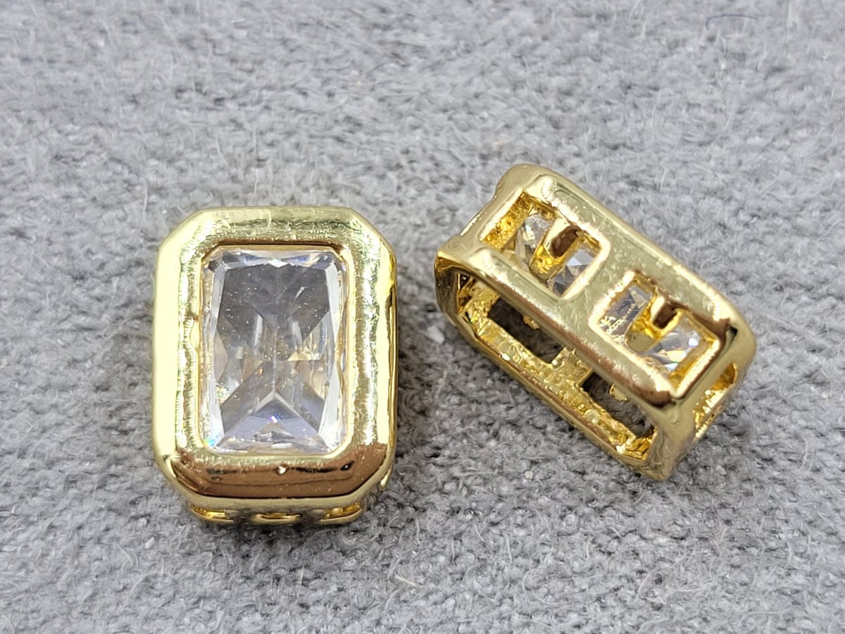 Бусина 7*9 мм т. 4 мм лимона з білим стразом (гіпоалергений сплав)