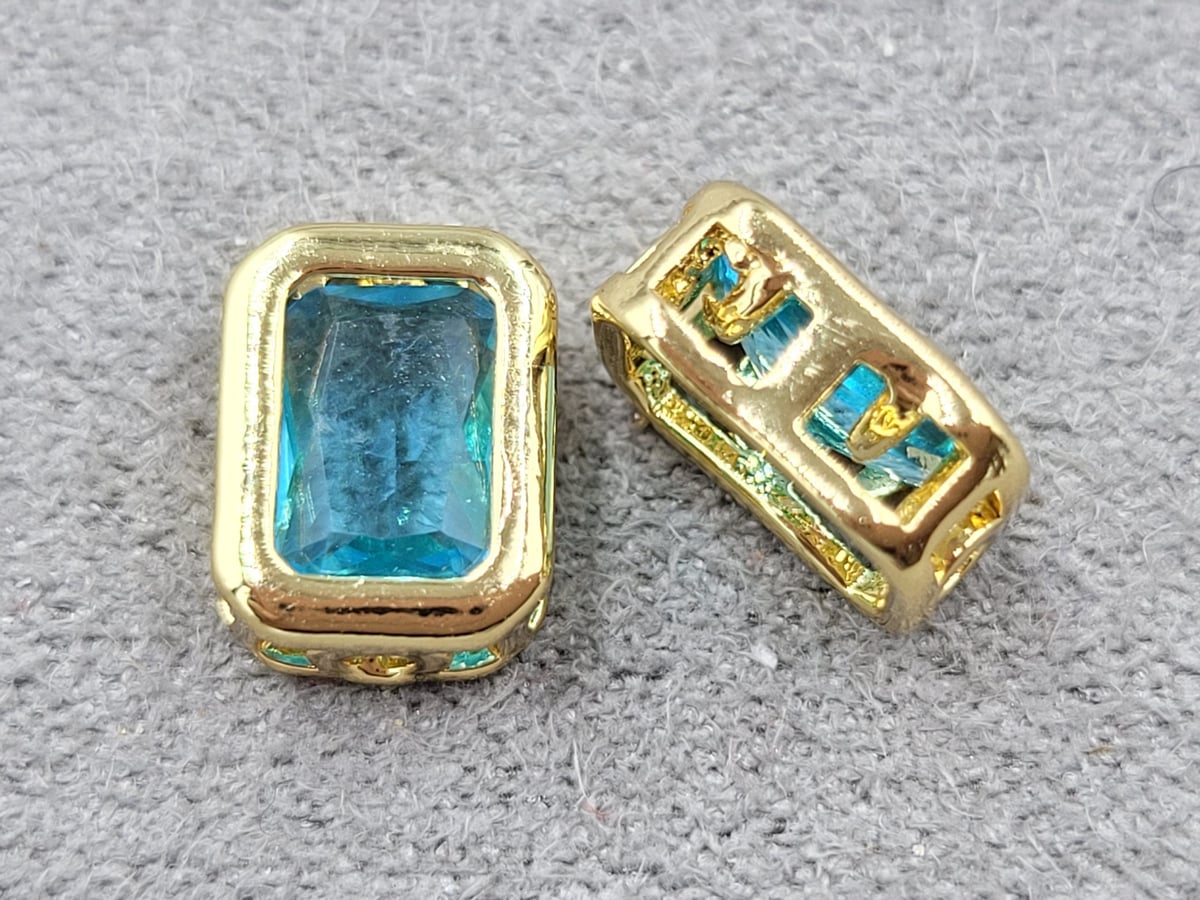 Бусина 7*9 мм т. 4 мм лимона з блакитним стразом (гіпоалергений сплав)