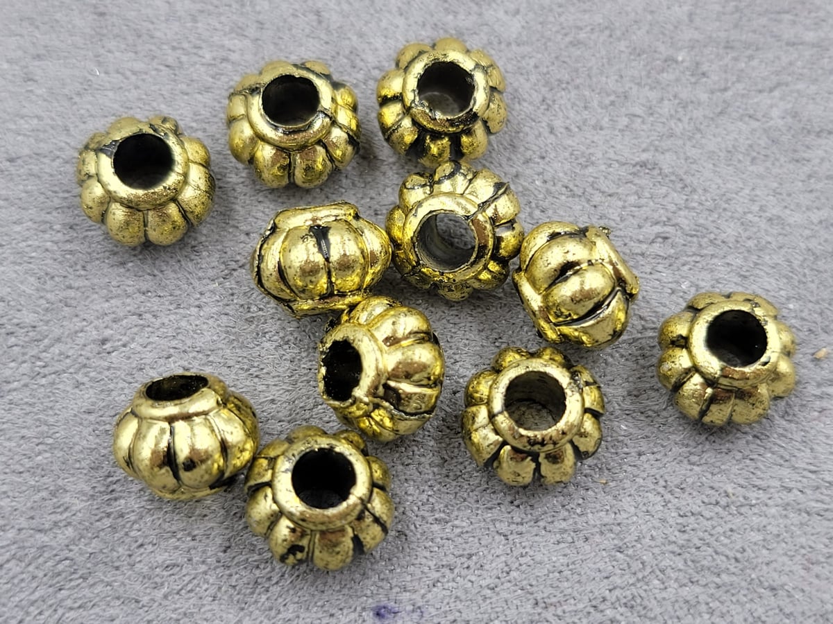 Бусина 7*8 мм пластикова 70 шт