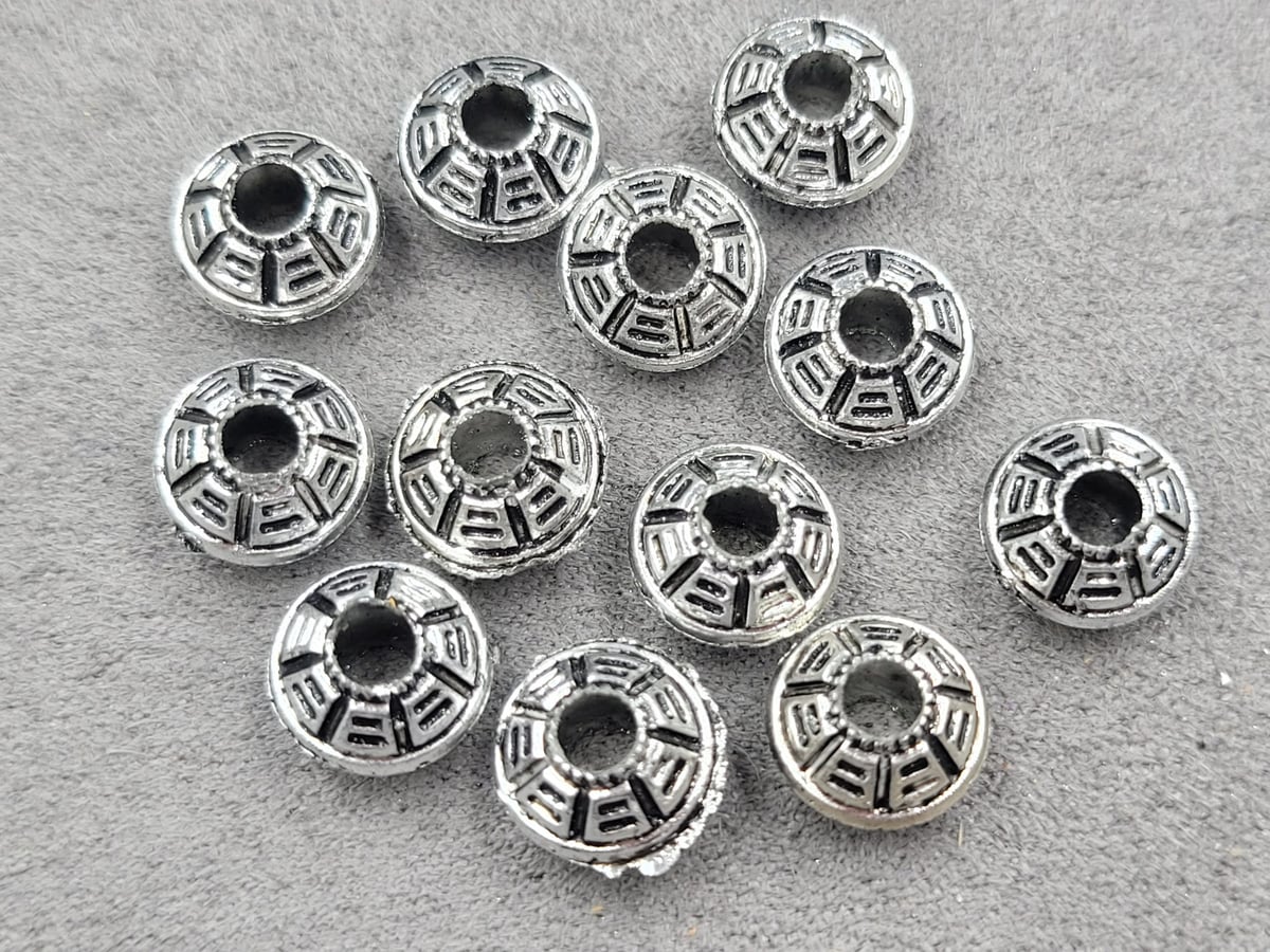 Бусина 7*10 мм пластикова 55 шт