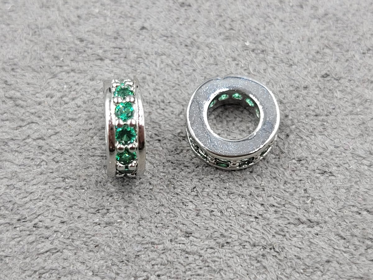 Рондель 3*7,5 мм отв. 4 мм с зеленими стразами родій (гіпоалергений сплав)