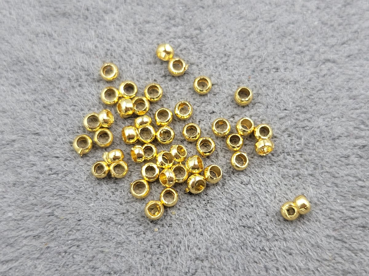 Стопери 2 мм 100 шт колір лимонне золото (гіпоалергений сплав)