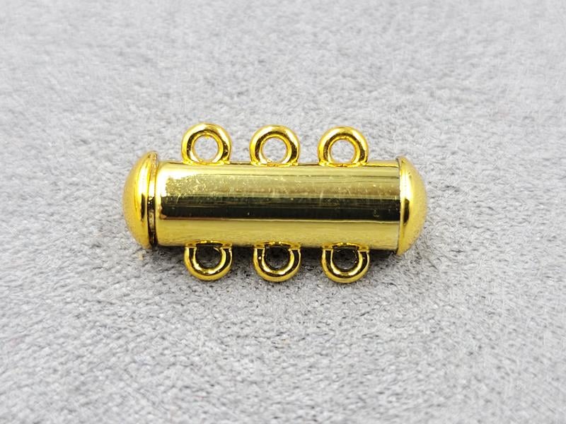 Замок магнітний 6*20 мм на 3 лінії колір лимонне золото