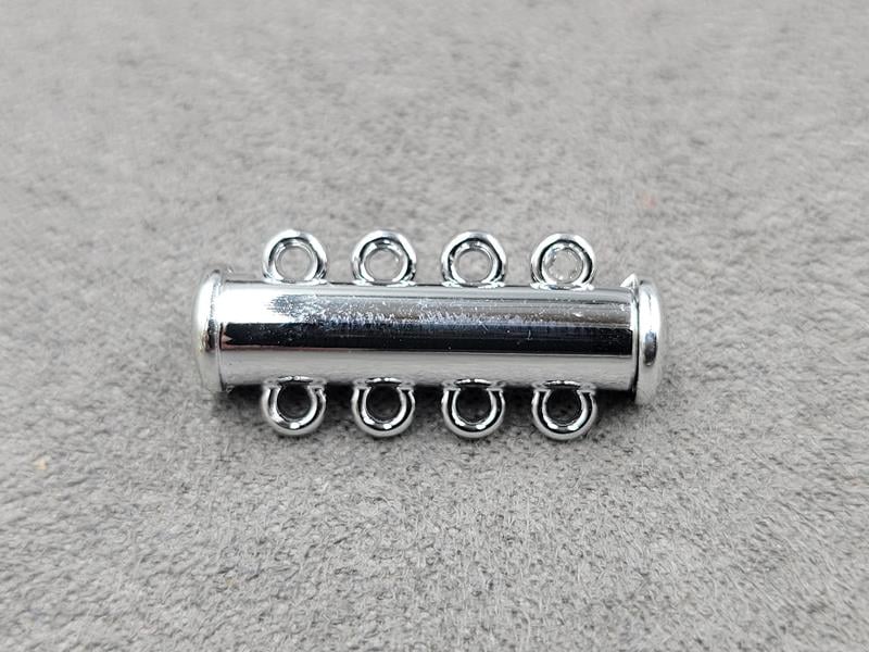 Замок магнітний 6*24 мм на 4 лінії колір сталь