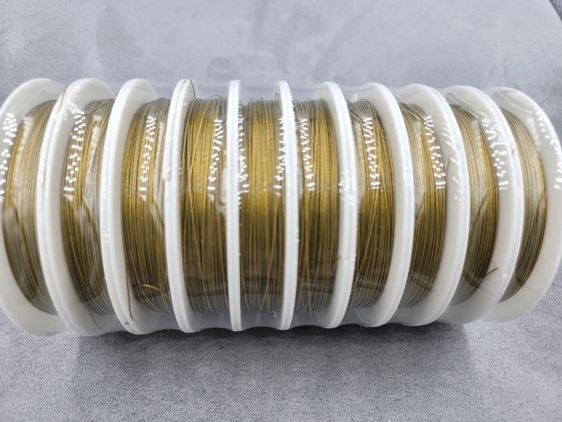 Ювелірний трос 0,38 мм 10 штук (біля 25 м) темне лимонне золото