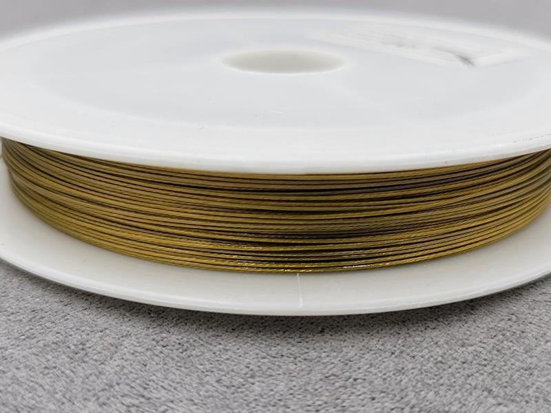 Ювелірний трос 0,38 мм 1 штука  (біля 25 м) темне лимонне золото