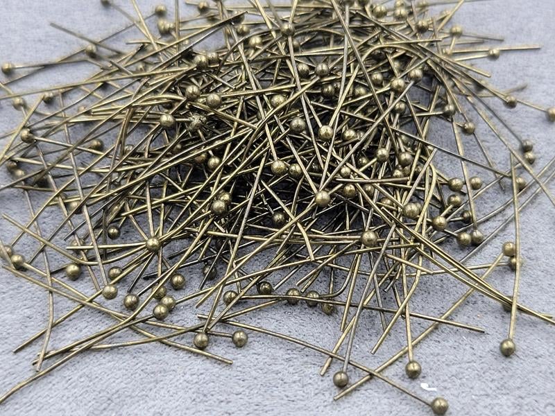 Піни 3 см біля 500 шт колір бронза